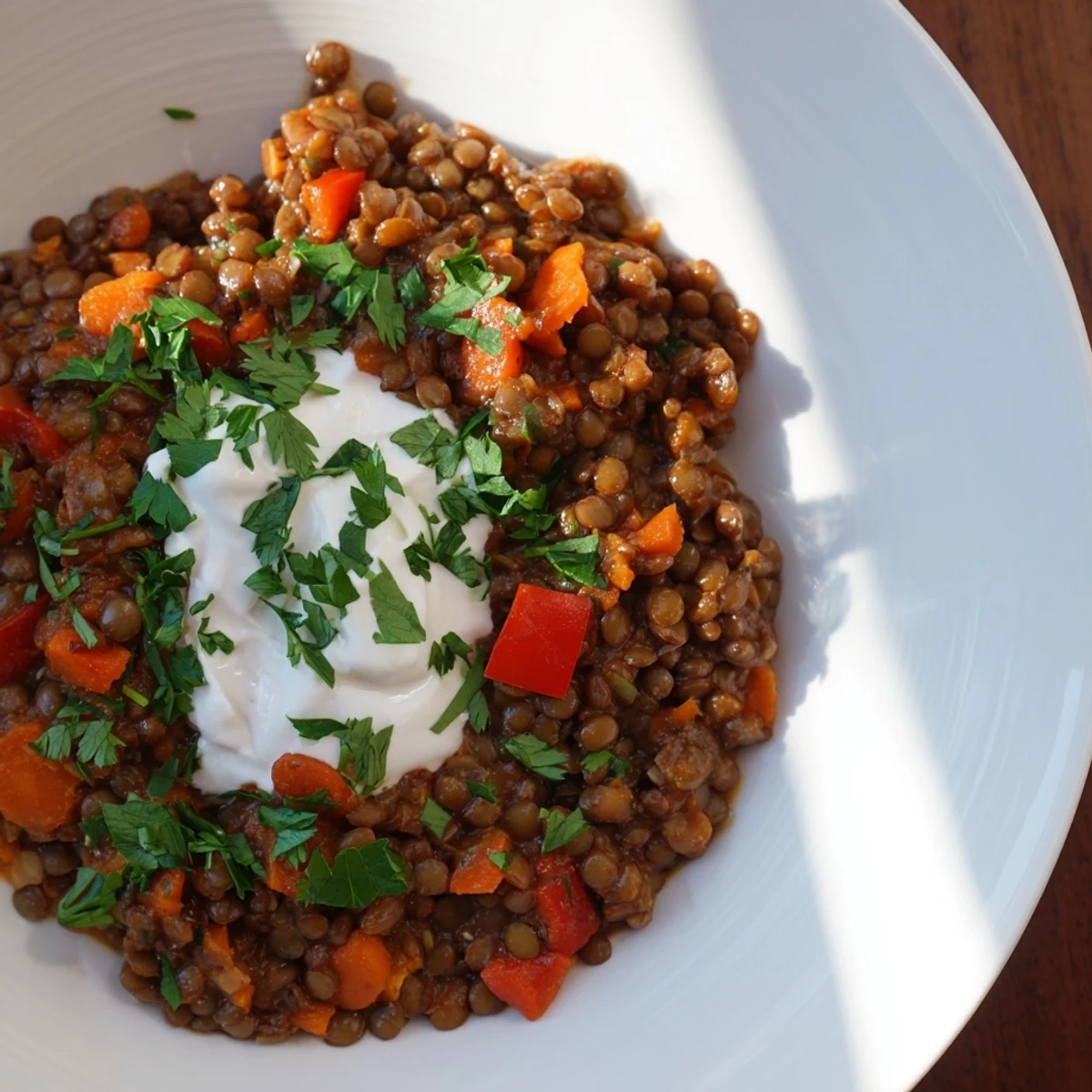 Steaming Wheat-Warm Hearty Lentil Curry: a hearty vegetarian stew with colorful vegetables.
