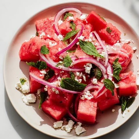 Vibrant Watermelon Feta Salad featuring juicy watermelon, creamy feta, and fresh mint ready to enjoy.