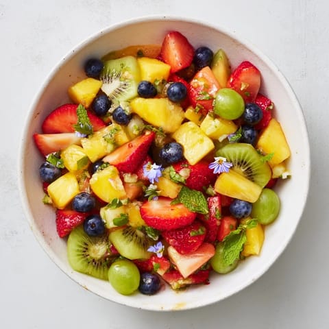 Bright and sweet, the Festive Bow Fruit Medley glistens, ready to serve at your next gathering.