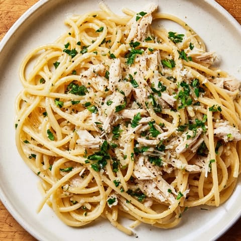 Steaming Simple Garlic Butter Bucatini, a savory Italian pasta dish served hot and ready.