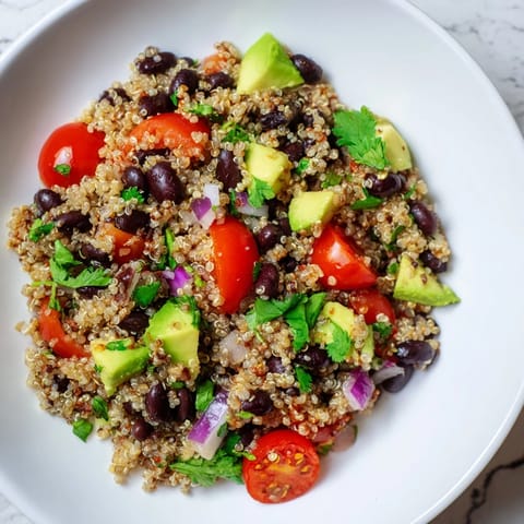 Chilled quinoa black bean salad, a refreshing, healthy lunch with a zesty flavor profile.