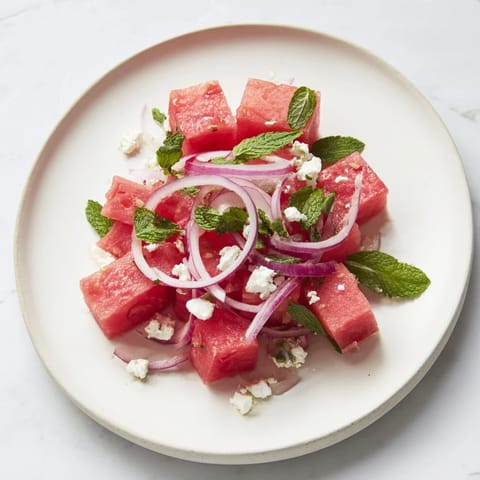 Top-down shot of a colorful Watermelon Feta Salad, perfect for a light and refreshing summer meal.